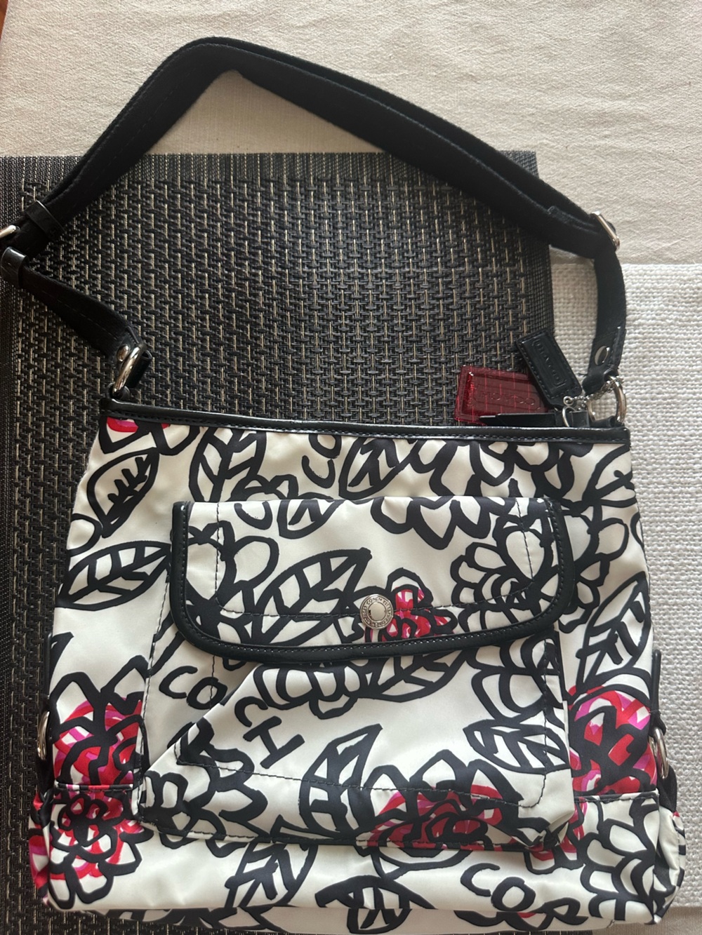 Coach Black & White Floral Shoulder Bag with Pink Accents